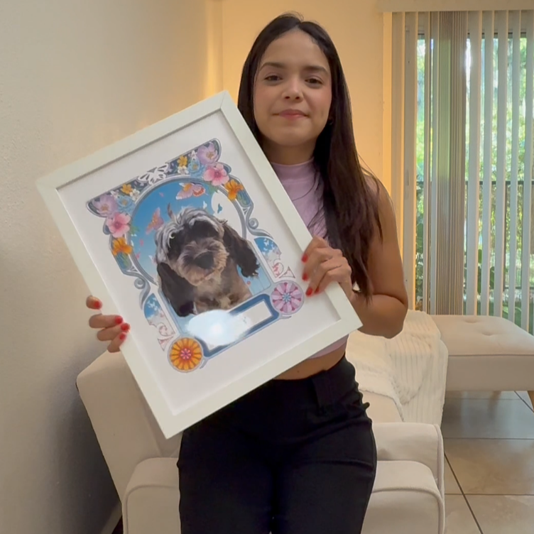Woman holding a framed painting of a dog, with text overlay on a computer screen.