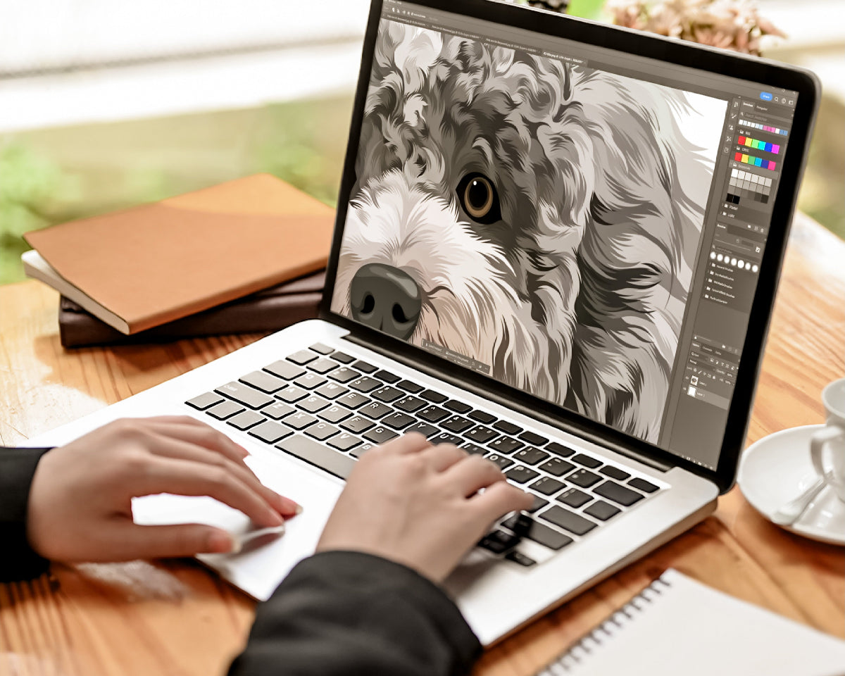 Person using a laptop with a dog illustration on the screen at a desk.